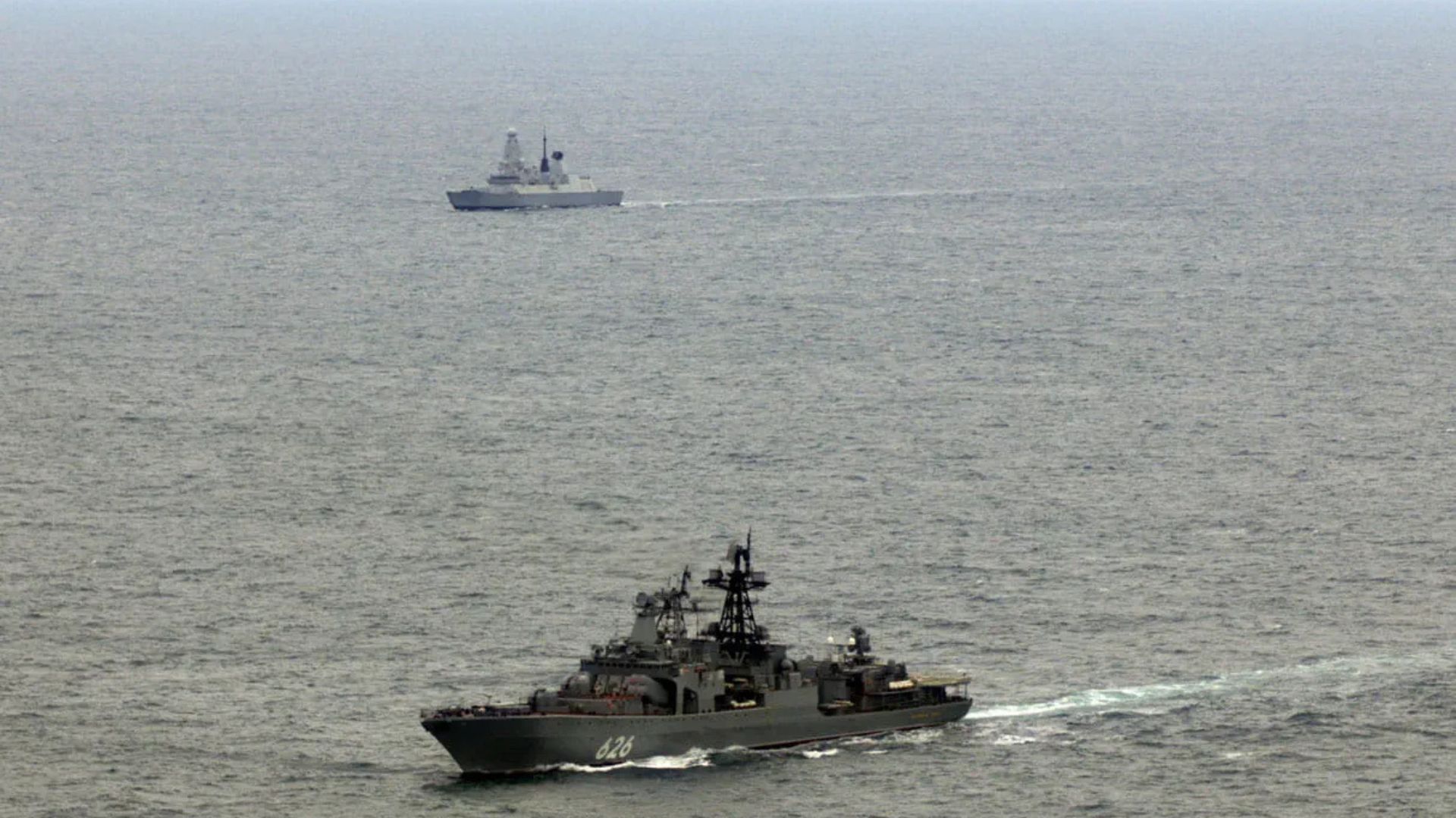 HMS Duncan tracks Admiral Kulakov in the foreground, as it transited through the English Channel